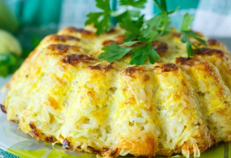 Chicken and Cheese Rice Pie made in a bundt type tin topped with parsley