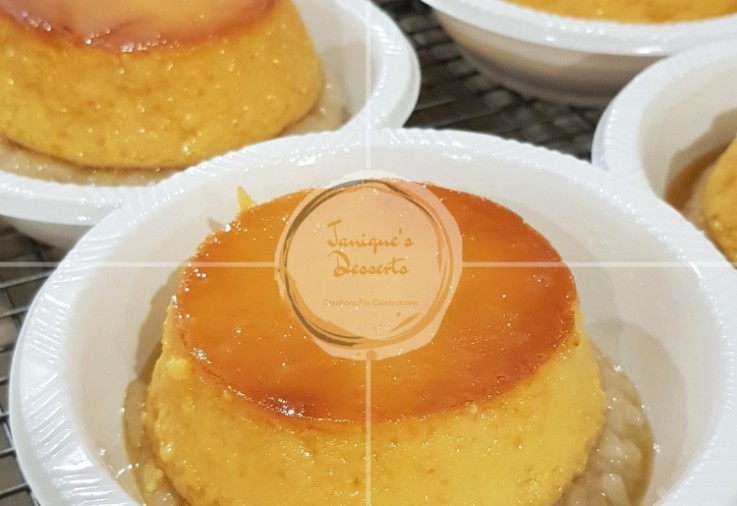 A Yellow and Gold Sweet Rice Cake with Egg Custard sitting on top