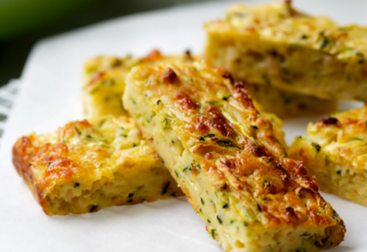 Yummy zucchini slice recipe, baked to perfection, cut into rectangles easy to eat