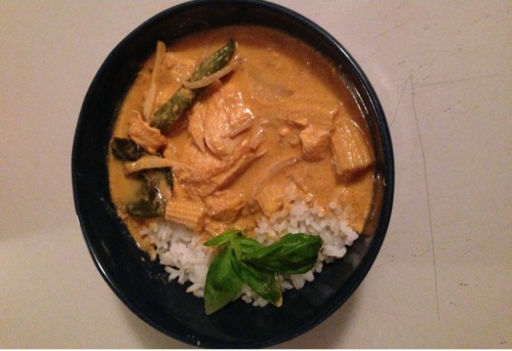 thai red curry with rice basil Asian vegetables. Creamy curry