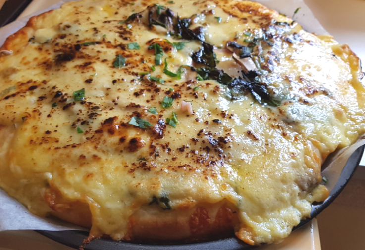 delicious cheesy bread topped with melted cheese and herbs