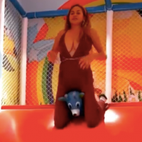 Chrissy Teigen's 'Boobilicious' Wardrobe Malfunction On Kids' Slide