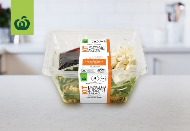 image of woolworths roasted pumpkin and grains salad kit on kitchen bench