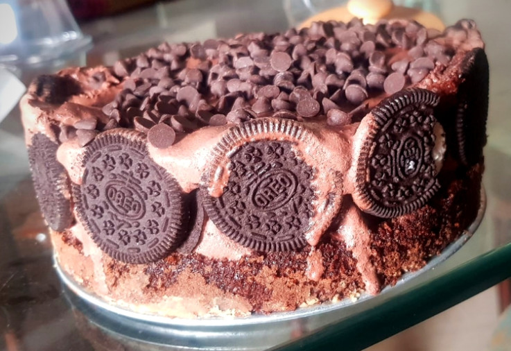 Oreo Cake made with chocolate sponge and homemade chocolate ice cream set into a cake shape using a spring form cake pan