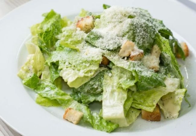 Salad Recipes_Caesar Salad made with cos lettuce, croutons, parmesan cheese and a light dressing