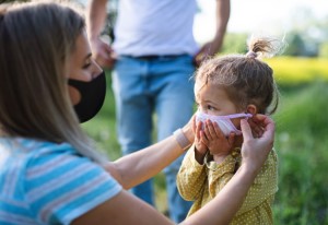family with face masks