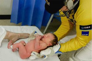 Dad catches baby in Aussie themed birth announcement