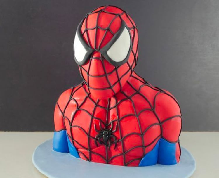 Kids' cake made in the shape of Spiderman.