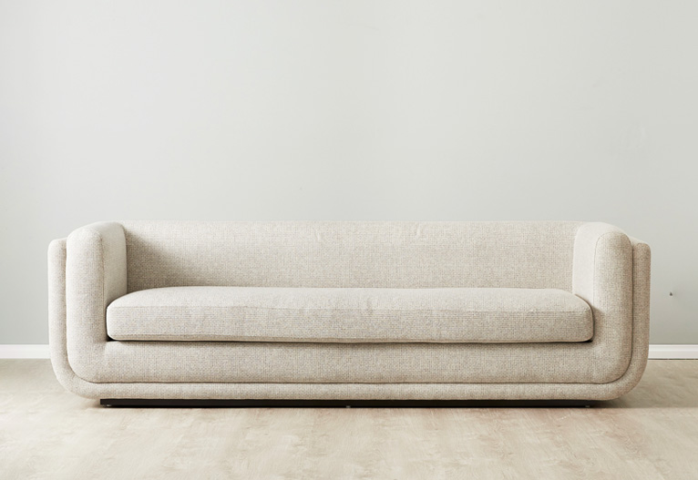 Clementine sofa with rounded armrests