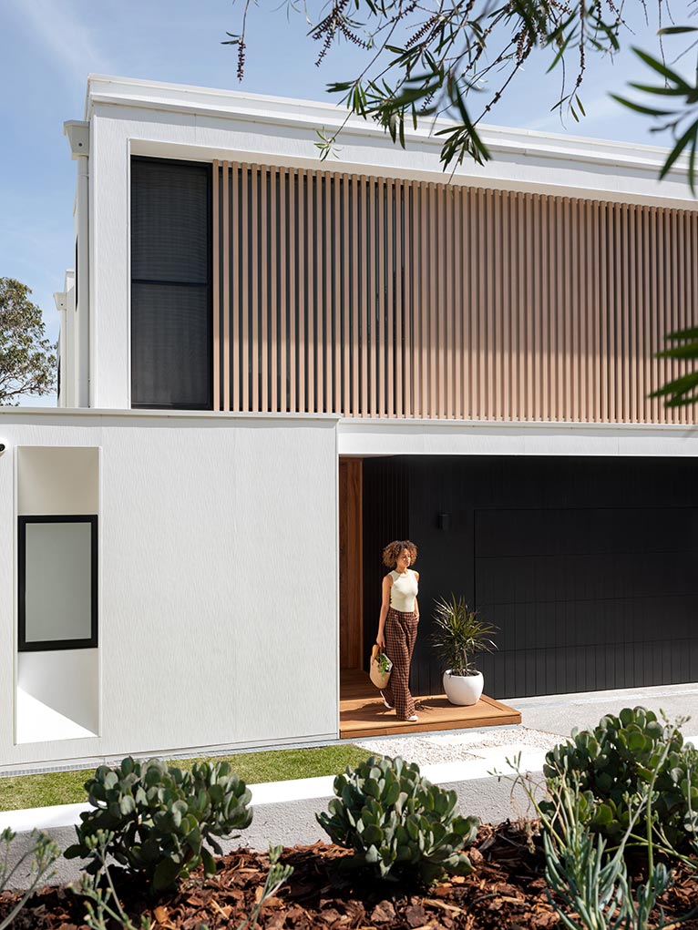 Exterior of Bennett House by Futureflip featuring white concrete cladding.