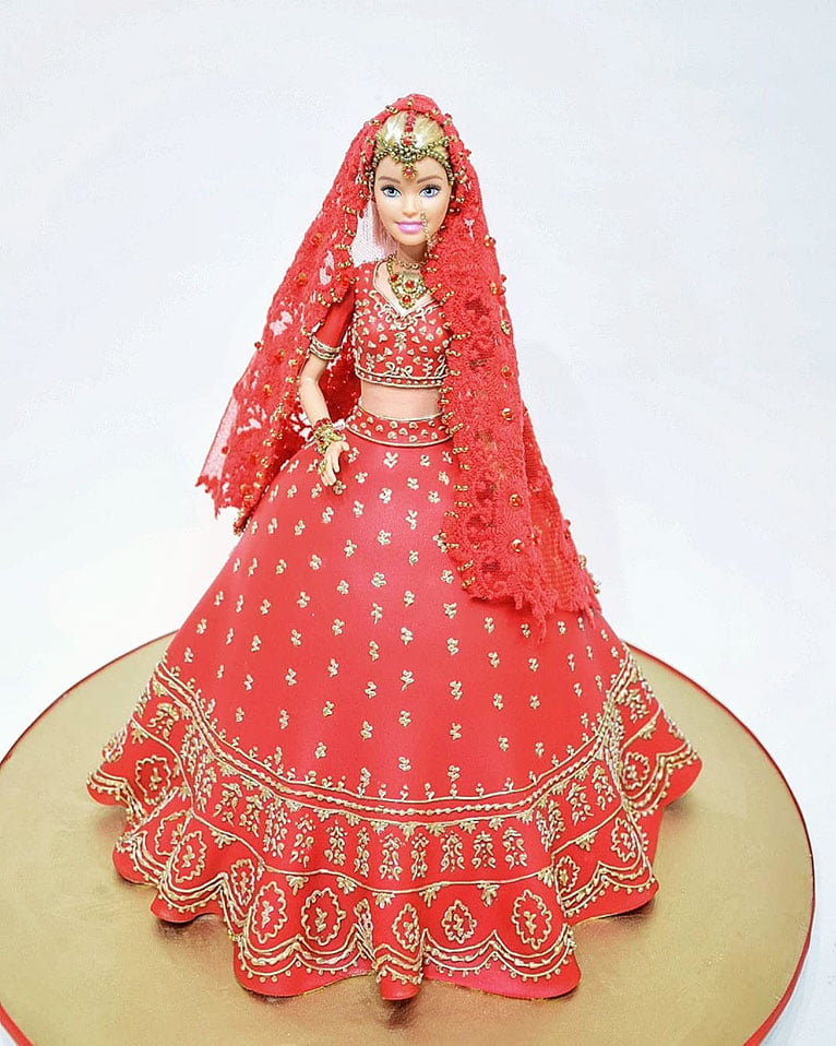 Birthday cake designed in the shape of a Bollywood dancer.