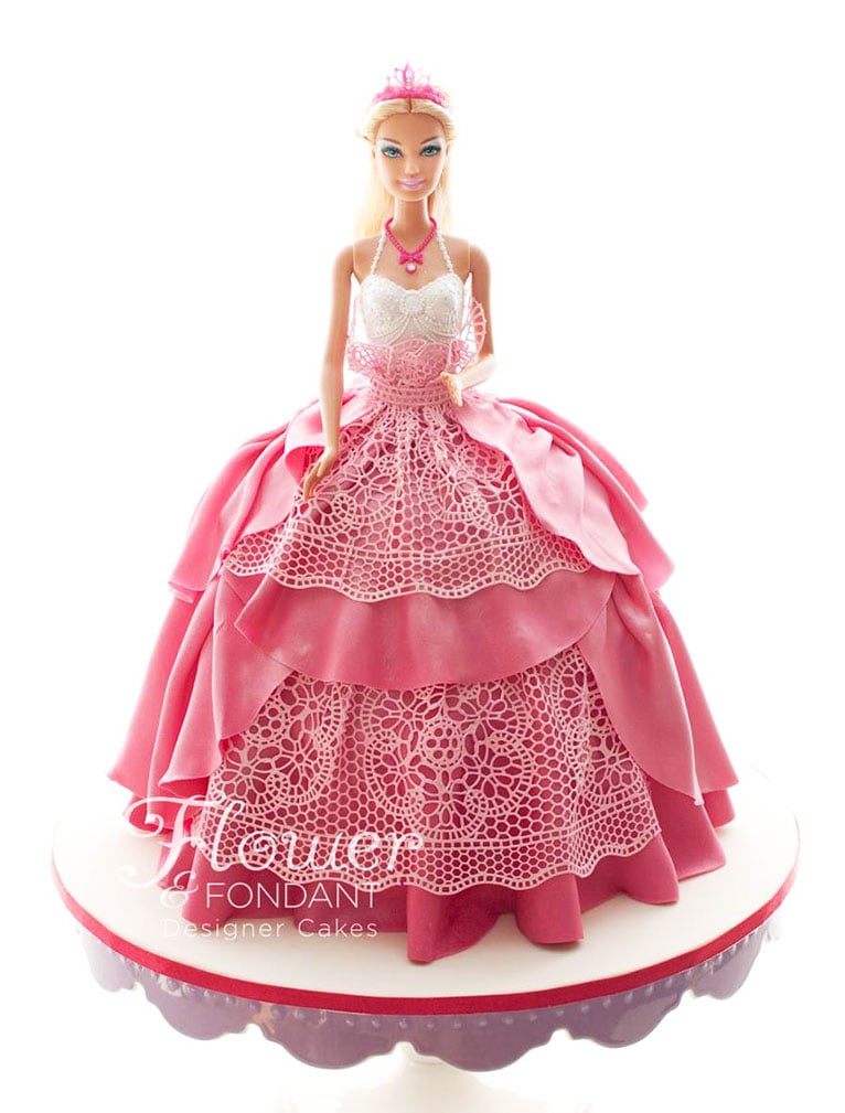 Pink Dolly varden cake with Barbie figure included.