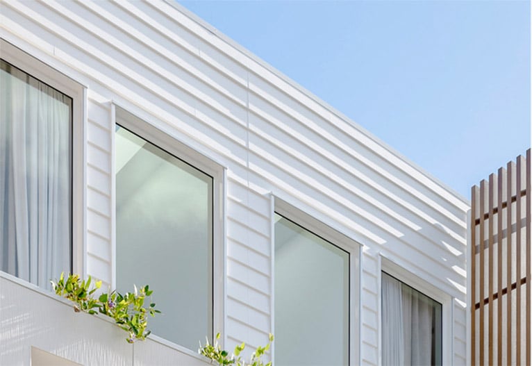 White Linea Weatherboard shown up close on a modern house. 