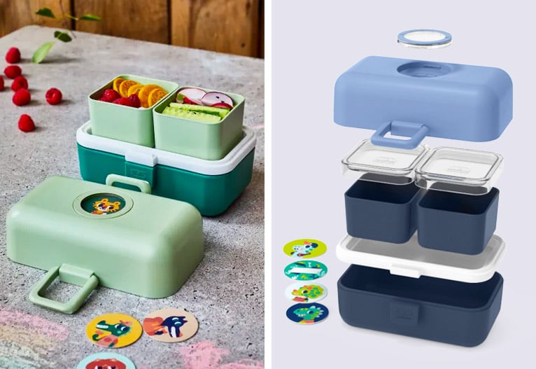 Monbento kids' lunch boxes in forest green and blue.