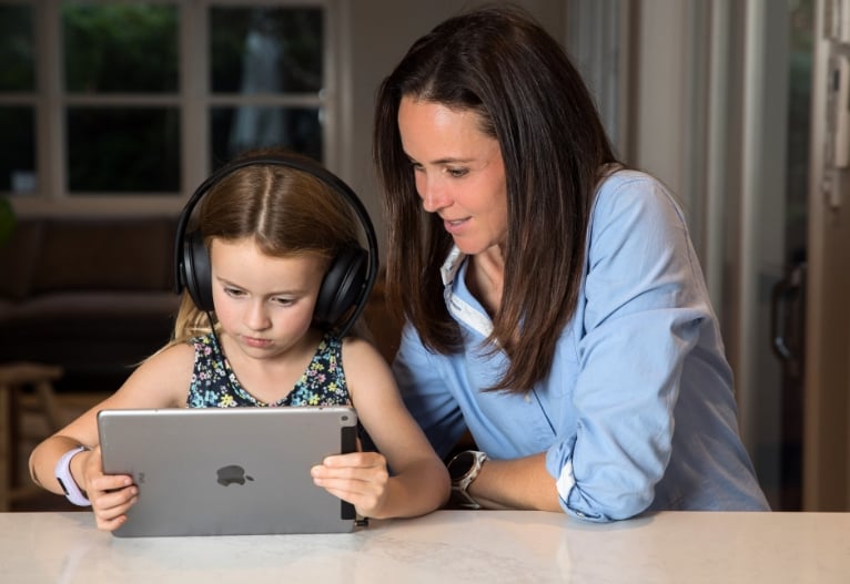 mum and daughter using the Sound Scouts hearing test app - sound scouts review