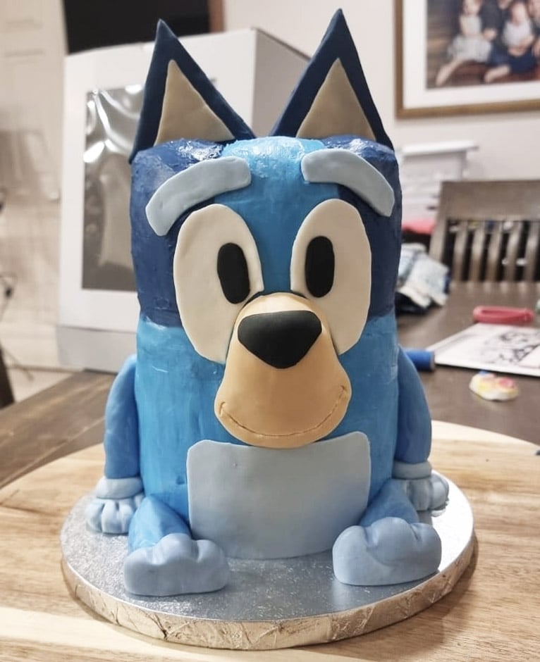 3D sitting Bluey cake via Hayley Sutton.