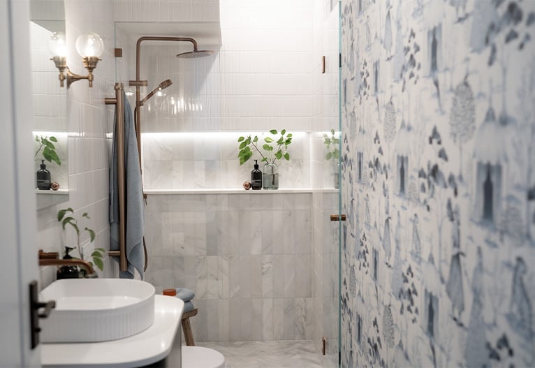 Guest bathroom with brushed copper tapware.